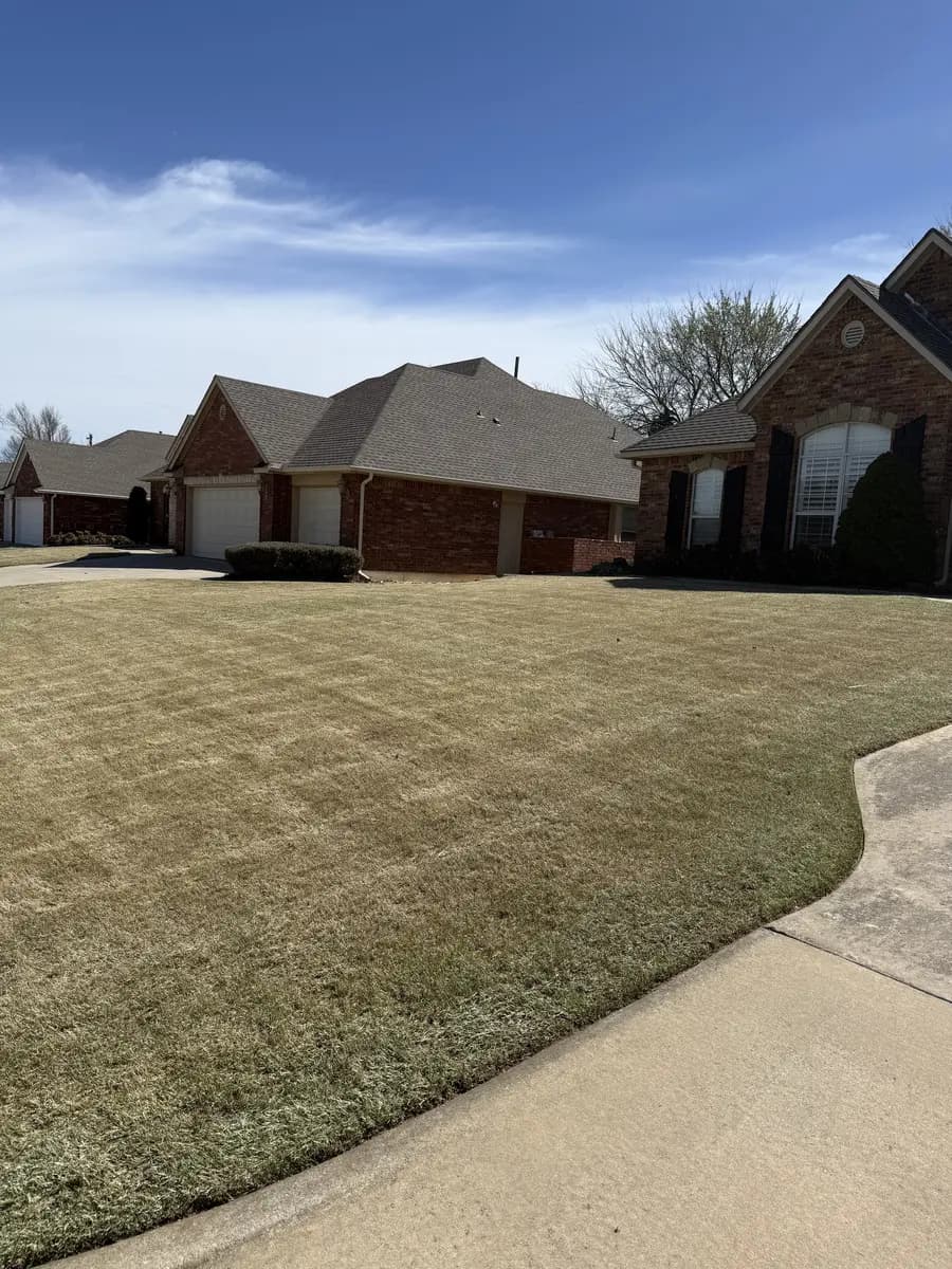 Residential lawn evaluated for compaction and seasonal soil care